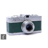 A Meopta Mikroma II Sub Miniature Camera, green leatherette and chrome, with Meopta Mirar f/3.5 20mm