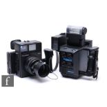 A Polaroid 600 SE medium format press photography camera with Mamiya 1:47 f127mm lens, serial number