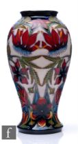 Shirley Hayes - Moorcroft Pottery - A vase of baluster form, shape 46/10, decorated in the Delonix