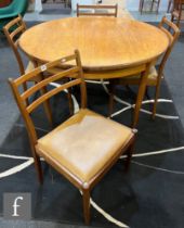 G-Plan Furniture - A set of four teak model 4534 ladderback dining chairs with drop in seats,