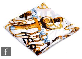 Hermes - A Cliquetis silk scarf decorated with sword hilts and pommels, no box, 89cm x 85cm.