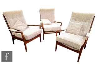 In the manner of Cintique - Three open armchairs with stained beech frames, un-labelled, some scuffs