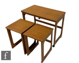 Tom Robertson - A.H. McIntosh & Co Ltd - A nest of teak occasional tables raised to strut loop