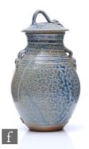 Barry Huggett - A contemporary studio stoneware lar lidded jar of ovoid form with applied decorative