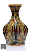 Alicia Amison - Moorcroft Pottery - A vase of lobed form with flared neck, shape 31/9, decorated