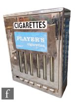 Brecknell Dolman and Rogers Ltd - A chromium plated wall mounted cigarette dispensing machine,