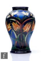 Philip Gibson - Moorcroft Pottery - A vase of baluster form, shape 65/6, decorated in the Loch
