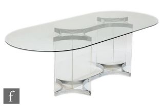 Richard Young - Merrow Associates - A 1970s Boulton dining table, the oval glass top above a