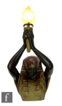 Unknown - A mid Century vintage Pharaoh wall light, the figural relief moulded light fitting