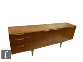 Tom Robertson - McIntosh of Kirkcaldy - A teak Dunvegan sideboard, fitted with a central double door