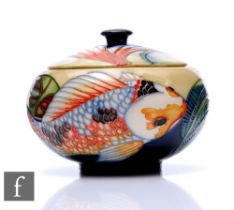Philip Gibson - Moorcroft Pottery - A lidded bowl of squat ovoid form, shape 147/5, decorated in the
