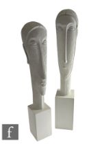 Artform - A graduated pair of contemporary sculptures depicting a stylised head of a man and woman