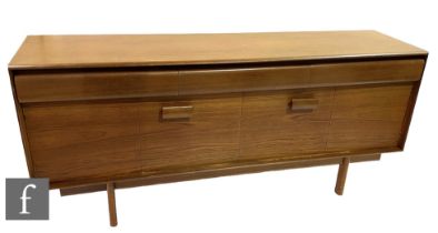 White and Newton - A teak sideboard fitted with three frieze drawers above two folding double doors,