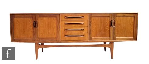 Victor B Wilkins - G-Plan Furniture - A teak 'Fresco' sideboard, fitted with a central bank of