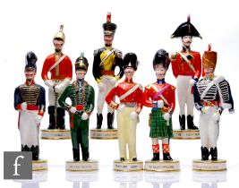 Clarice Cliff - The Old Brigade - A complete set of eight figures modelled as military figures,