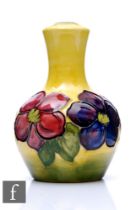 Moorcroft Pottery - A small lamp base, of ovoid form with tall flared neck, decorated in the