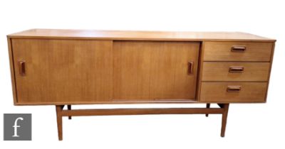 Musterring Mobel, Danish - A teak sideboard, fitted with a sliding double door cupboard beside a