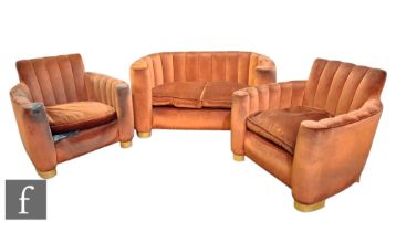 Unknown designer - An Art Deco three-piece lounge suite comprising two seat sofa and a pair of