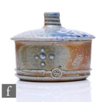 Barry Huggett - A contemporary studio stoneware lidded box of cylinder form, decorated with relief