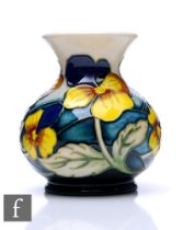 Kerry Goodwin - Moorcroft Pottery - A small vase of squat ovoid form with flared neck, decorated
