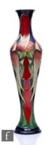 Philip Gibson - Moorcroft Pottery - A vase of tall slender baluster form, shape 138/12, decorated in