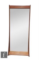 Attributed to Pedersen and Hansen - A teak framed wall mirror with integral shelf, height 112cm