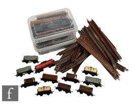 A collection of TT gauge Triang items, to include rolling stock, passenger coaches, a locomotive for
