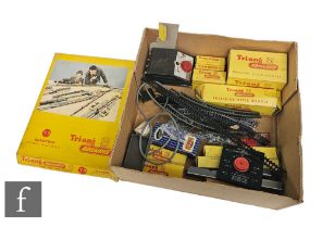 A TT gauge Triang T9 train set, with a selection of boxed accessories including an engine shed.