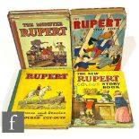 A collection of assorted Rupert Books, Rupert Little Bear More Stories, Rupert Pictures and
