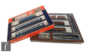 Two O gauge Lima train sets, 0158P with 0-6-0 LMS maroon 4684 locomotive and two passenger