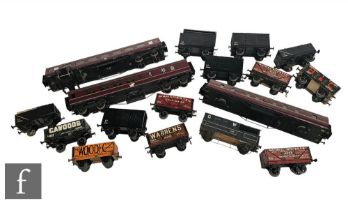 A collection of O gauge rolling stock and passenger coaches, to include some kit built examples,