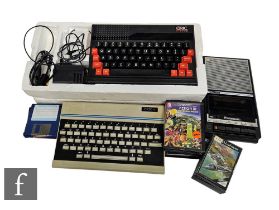 An Oric Atmos 48K and an Oric-1, with a selection of games including Xenon 1, Zorgon's Revenge,