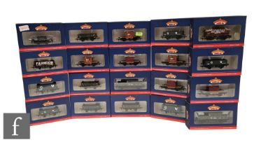 A collection of OO gauge Bachmann rolling stock, to include tippler wagons, plank wagons, conflat