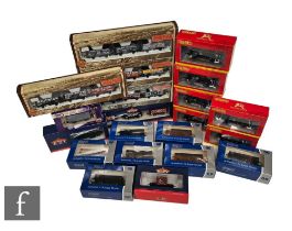 A collection of OO gauge rolling stock by Bachmann, Dapol and Hornby, including a number of sets,