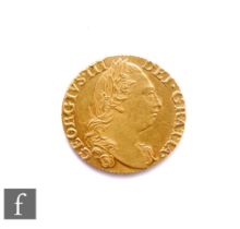 George III (1760-1820) - A Guinea, 1785, fourth laureate head right  reverse crowned garnished