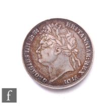 George IV (1820-1830) - A crown, 1821, laureate head facing left, reverse George & Dragon over date,