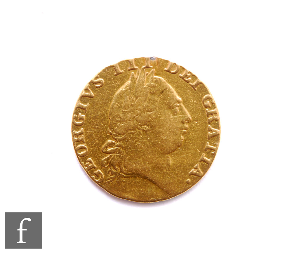 George III (1760-1820) - A Guinea, 1787, fifth issue, reverse crowned spade shield, 8.2g, S3729.