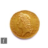 George II (1727-1760) - A five-Guineas, 1729, old laureate head facing left, reverse with crowned