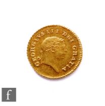 George III (1760-1820) - A third Guinea, 1810 laureate head facing right, reverse crown, 2.7g,