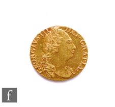 George III (1760-1820) - A Guinea, 1781, fourth laureate head right, reverse crowned garnished