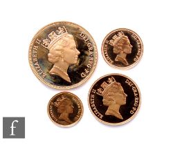 Elizabeth II - A gold four coin set, five pound, two pound, sovereign and half sovereign, 1985, no