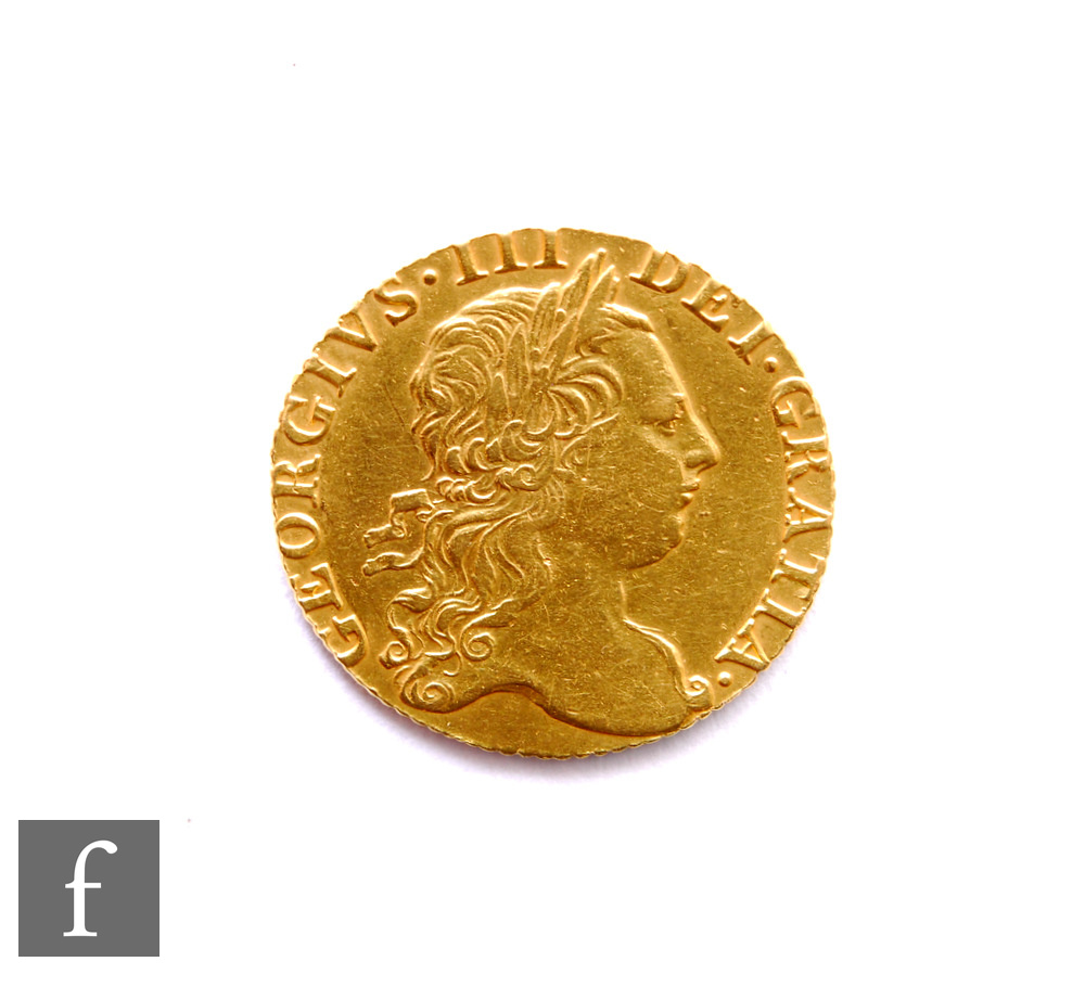 George III (1760-1820) - A Guinea, 1773, third laureate head right, reverse crowned garnished