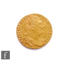 George III (1760-1820) - A Guinea, 1785, fourth laureate head right, reverse crowned garnished