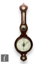 A 19th Century mahogany wheel barometer incorporating DRY/Damp dial, thermometer and level, height