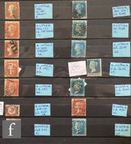 A blue Importa postage stamp album containing a collection of Great Britain stamps from Queen