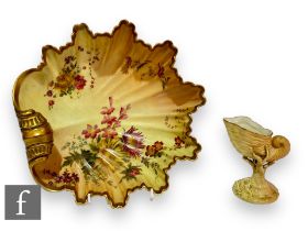 A large late 19th Century Royal Worcester table central bowl of shell form, shape 1274, transfer