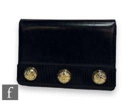 A 1990s Salvatore Ferragamo black leather mini crossbody bag, with fold over flap decorated with