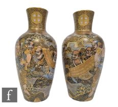 A pair of Japanese Satsuma (Meiji Period) Arhat vases, each of slender ovoid form decorated with