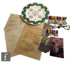 A medal group comprising a World War One pair, British War, Australia Service, Australian Efficiency