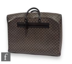 A Louis Vuitton Nolita large travel bag in the Damier Ebene canvas and brown leather pattern,